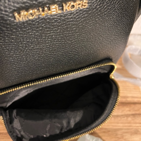 Michael Kors Women's Erin Medium
Pebbled Leather Backpack - Picture 3 of 6